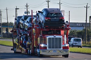 Read more about the article Should I Go For Open or Enclosed Car Shipping?